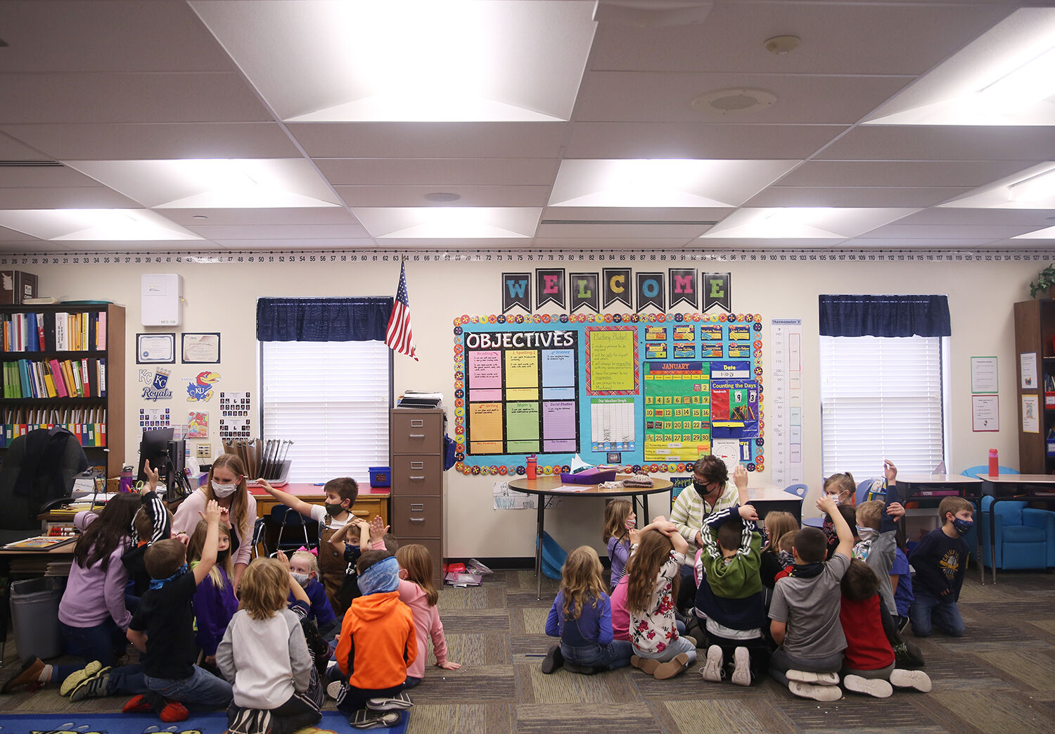 The first grade classes split up into several small groups